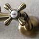 thumbnail image 2 of Grifo de cocina Kingston Brass Kingston de montaje en pared, latón antiguo, 2 of 6