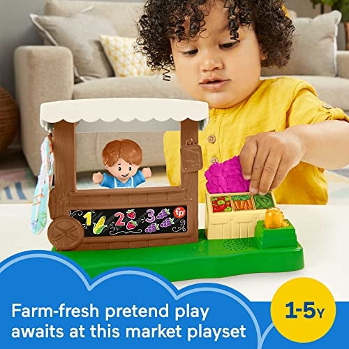 Fisher-Pealt Little People Farmers Market Playset para niños pequeños para simulacros de juego con ligero soun