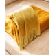 thumbnail image 4 of Manta Con Flecos Decorativa Y Tejido De Rombos En Relieve Color Amarillo, 4 of 4
