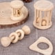 thumbnail image 3 of 4 Pieces Wooden Baby Rattle Toys, Montessori Teething Ring Log Geometric Grab Toy Set, Natural Wood Rattle Set For Infants And Toddlers, 3 of 4