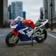 thumbnail image 4 of Moto Honda CBR900RR Fireblade Escala 1:18 - Welly, 4 of 5