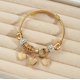 thumbnail image 1 of Brazalete Dorado mujer con charms, 1 of 2