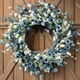 thumbnail image 1 of Corona de primavera Bibelot azul de 56 cm con hojas verdes y flores blancas, 1 of 7