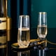thumbnail image 2 of Champagne Flutes N9R, 9 oz, plástico, sin tallo, borde dorado (paquete de 12), 2 of 7
