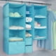 thumbnail image 2 of Organizador de armario con 3 compartimentos, armario colgante de tela con estructura de hierro, estante colgante plegable, sistema de almacenamiento para ropa, 2 of 8