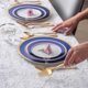 thumbnail image 2 of Juego de platos de plástico Stock Your Home de 125 piezas, blanco/azul/dorado, 2 of 6