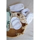 thumbnail image 1 of Kit Raíz | Cintillo + Muñequeras + Pétalos desmaquillantes + Scrunchies, 1 of 5