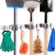 thumbnail image 1 of Organizador de porta escobas, soporte de pared de acero inoxidable, trapeadores de pared, 3 porta escobas, 4 ganchos para trapeadores, guantes y cepillos., 1 of 5