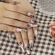 thumbnail image 4 of 24 uñas postizas francesas de ataúd color nude mediano con mariposa negra y pestañas adhesivas, limas de bailarina., 4 of 7