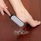 thumbnail image 1 of Get Smooth and Soft Feet with our Double-Sided Foot Dead Skin Removal Tool - Perfect for Everyday Use and Christmas Gifts!, 1 of 4