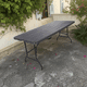 thumbnail image 1 of Mesa Plegable tipo Maleta Gris Simil Madera 180x74x74cm, 1 of 4