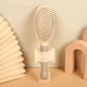 thumbnail image 1 of New Macaron Color Smooth Hair Airbag Comb Ladies Fashion Temperament Long Hair Airbag Massage Home Portable Airbag Comb, 1 of 3
